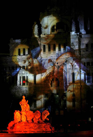 Cibeles Square is illuminated during a show as part of Christmas festivities