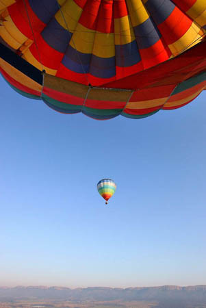 Johannesburg, South Africa: Hot air balloons soar over the Magaliesberg mountains
