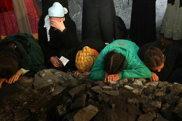 Nablus, West Bank: Orthodox Jewish women settlers pray at the tomb of the biblical patriarch Joseph