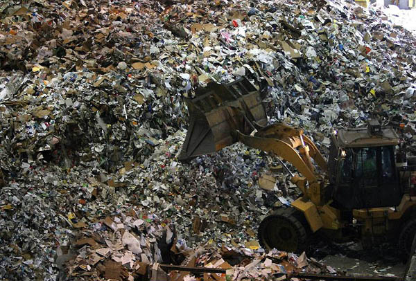 San Francisco, US: A tractor moves a pile of recyclables at a recycling centre