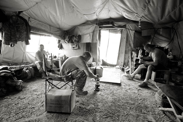 Photographer John D McHugh in Afghanistan