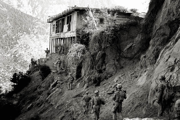 Photographer John D McHugh in Afghanistan