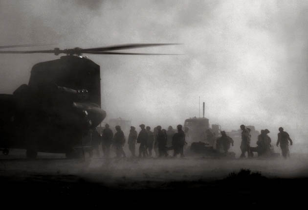 Photographer John D McHugh in Afghanistan