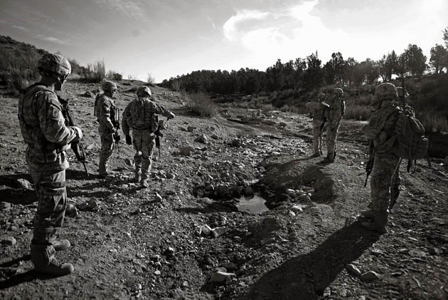 Photographer John D McHugh in Afghanistan