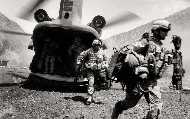 Photographer John D McHugh in Afghanistan