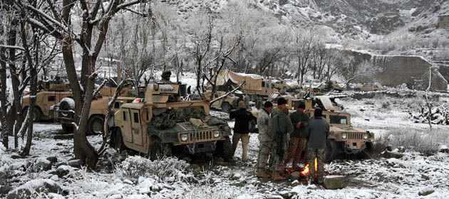 Photographer John D McHugh in Afghanistan