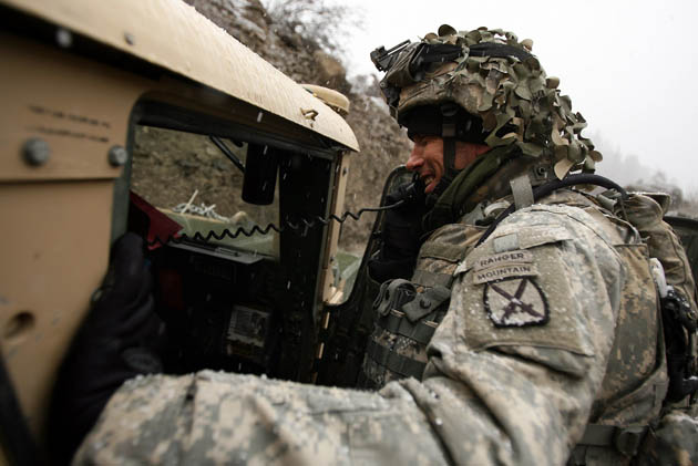 Photographer John D McHugh in Afghanistan