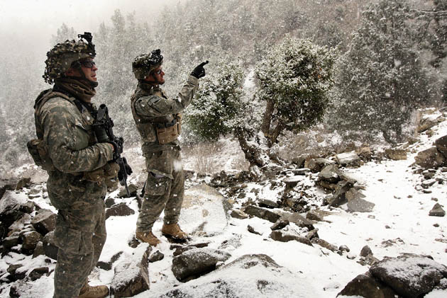 Photographer John D McHugh in Afghanistan