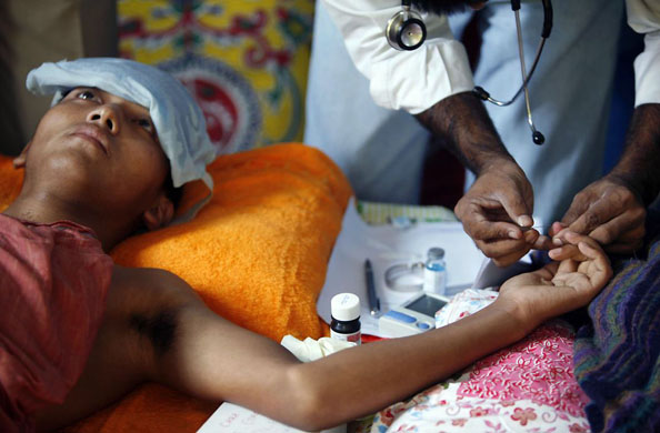 New Delhi, India: A Tibetan exile on a hunger strike