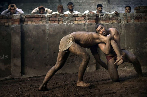 Lahore, Pakistan: Kushti wrestlers train at the Champion Khalu Behalwan wrestling club
