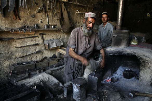 An Afghan blacksmith in Logar Province