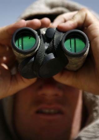 Captain Larry Workman, 101st Airborne Division on patrol in Afghanistan
