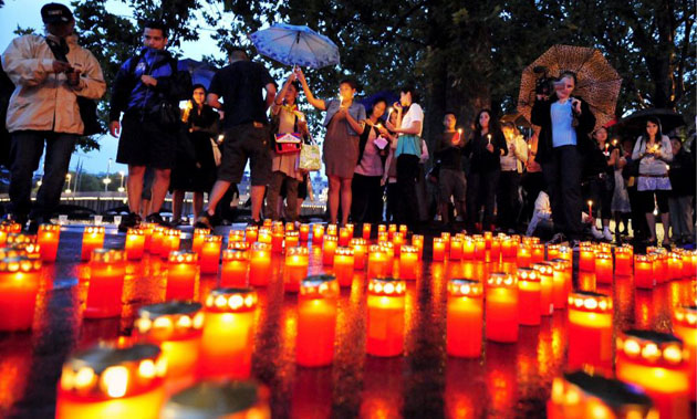 Zurich, Switzerland: Tibetans stage a candlelight vigil during their campaign for human rights in China