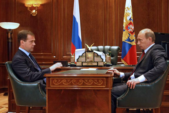 Russia's President Dmitry Medvedev and Prime Minister Vladimir Putin discuss the situation in South Ossetia
