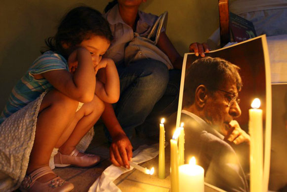 candle-lit vigil for the ate Palestinian poet Mahmoud Darwish