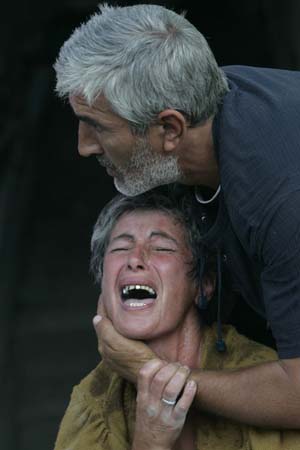 A Georgian woman mourns her dead son
