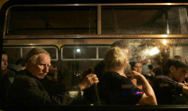 Zugdidi, Georgia: Georgian refugees from Abkhazia wait on a bus during a stopover for food