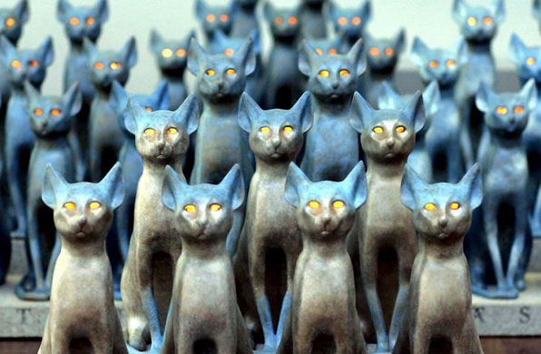 Bielefeld, Germany: Cat scupltures titled 'Bastet' by Yoko Ono on display at the Art Hall