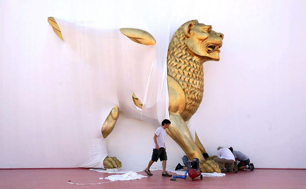Venice, Italy: The finishing touches are put to the facade of the Palazzo del Cinema ahead of the 65th Venice Film Festival