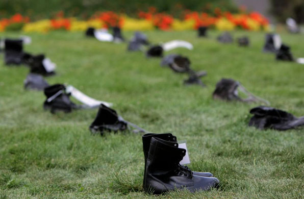 Denver, US: The American Friends Service Committee displays their 'Empty Shoes' project in Cuernavaca Park