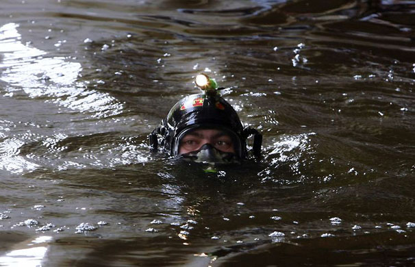 Tel Aviv, Israel: Police search for the body of four-year-old girl, believed to have been murdered by her grandfather, at the Yarkon river