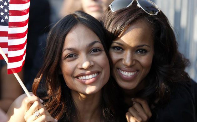 Actresses Rosario Dawson (left) and Kerry Washington pose together at Invesco Field in Denver on the final day of the Democratic convention 