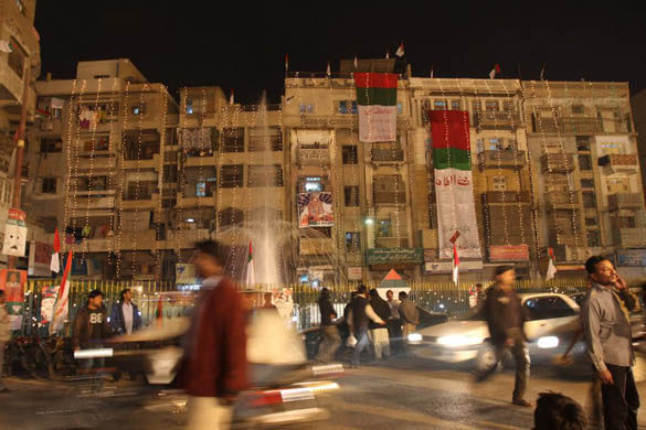 Karachi, Pakistan: A building is decorated during preparations for the upcoming elections