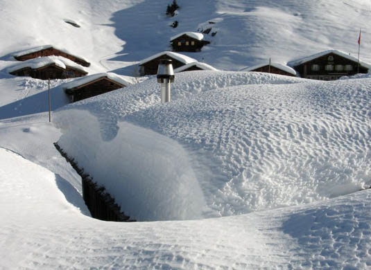 St Antoenien, Switzerland: Snow covers the 'Sunnistafel' cottages