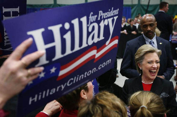 Hillary Clinton greets voters following a rally at St Norbert College