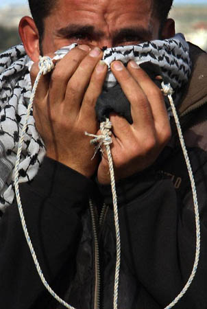 A Palestinian stone-thrower