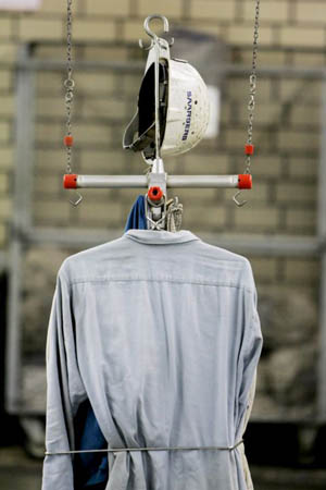 A miner's helmet and work suit at coal mine 'Anlage Nordschacht'
