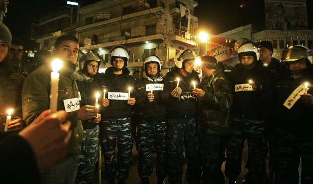 Palestinian riot police protest about Gazan fuel shortages in Ramallah