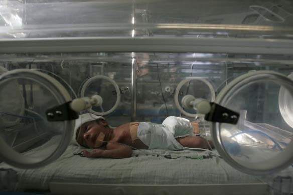 A palestinian infant in an incubator at the Al-Shifa hospital in Gaza