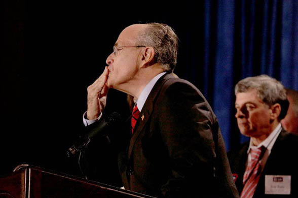Rudy Giuliani blows a kiss to supporters