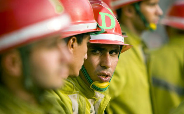 Tehran, Iran: Rescue workers during a search for survivors after a residential building collapsed