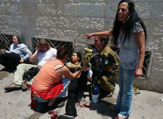 Bulldozer crashes into Jerusalem bus