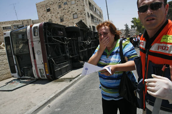 Bulldozer crashes into Jerusalem bus