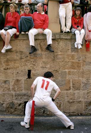 A runner stretches before the run