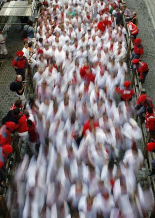 Revelers chased by bulls