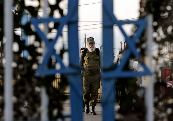 Israel: An Israeli army Rabbi walks inside the Rosh Hanikra border crossing between Israel and Lebanon