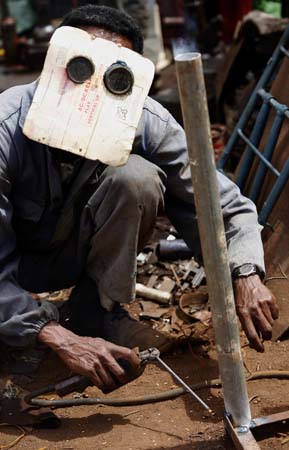welder in homemade mask