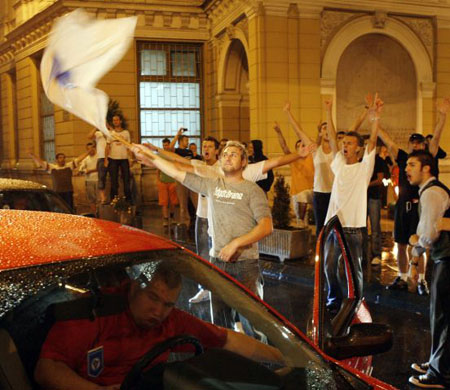 July 2008, Sarajevo, Bosnia: Residents celebrate in the streets after hearing the news of Radovan Karadzic's arrest in Belgrade