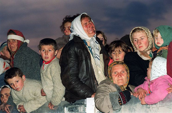 March 1993, Tuzla, Bosnia: A refugee from the Serb-besieged Bosnian enclave of Srebrenica bursts into tears upon her arrival in Tuzla