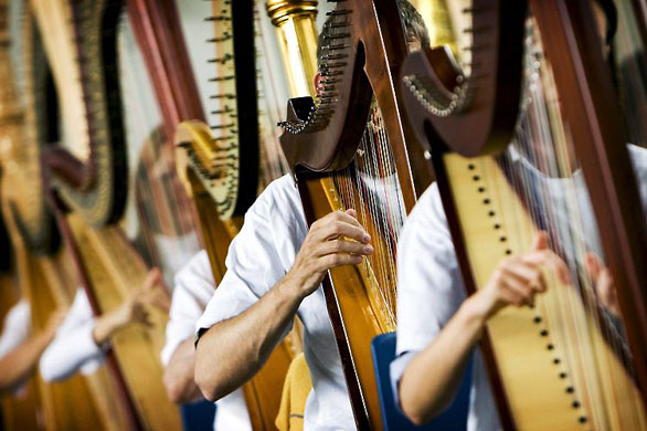 Amsterdam, Netherlands: Participants in an attempt on the world record for the biggest orchestra of harps at the Harp Festival
