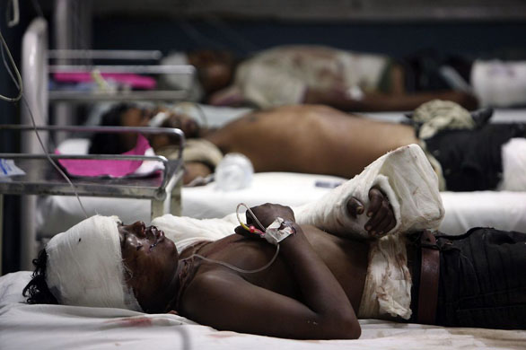 Jammu, India: Injured bus passengers rest in a hospital. At least 14 people died and 33 others were injured when a bus fell into a deep gorge in Sher-Bibi