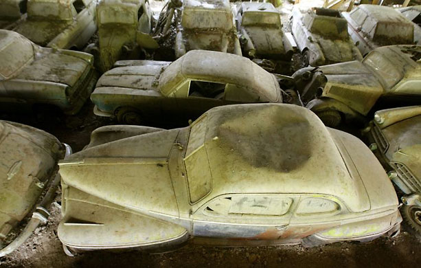 Kaufdorf, Germany: Vintage cars are parked at the Autofriedhof Franz Messerli auto graveyard