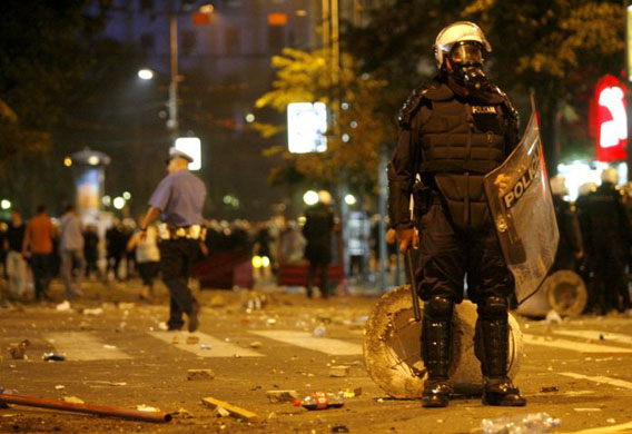Belgrade, Serbia: A police officer stands on the street during clashes with protesters, following an anti-government rally in support of Radovan Karadzic