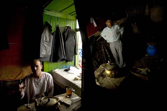 Zabi Baheer and his son Namir in in the family Tailor Shop in Kabul 