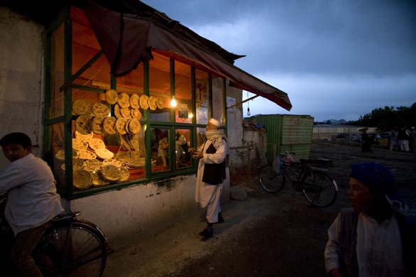 A bread shop at dusk in Kabul