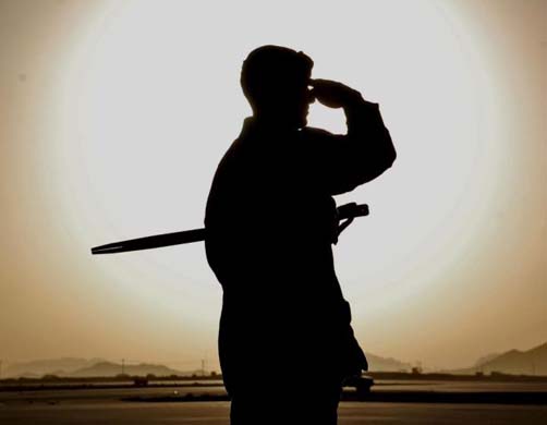 A Canadian soldier salutes